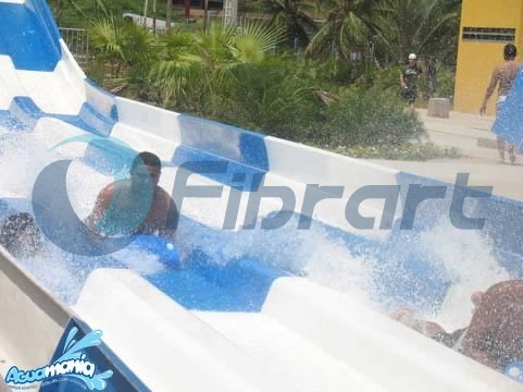 Visitors having fun on mat racer Aguamania
